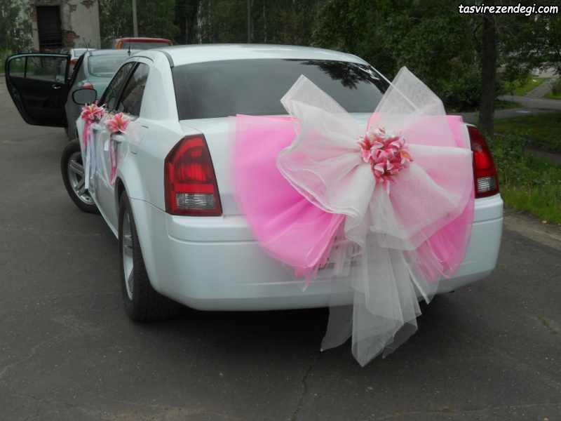 ماشین عروس با گل صورتی